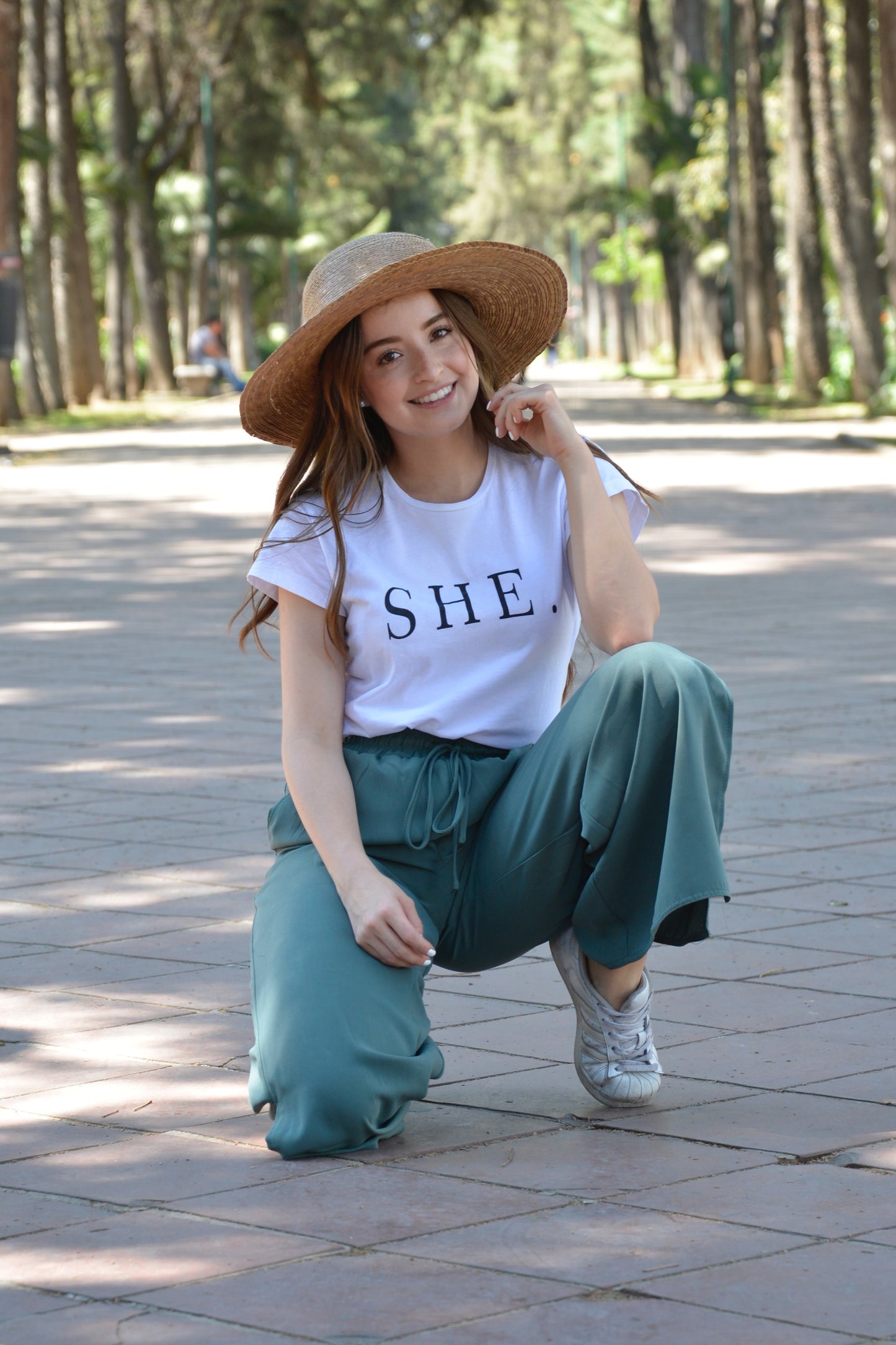 SHE.
