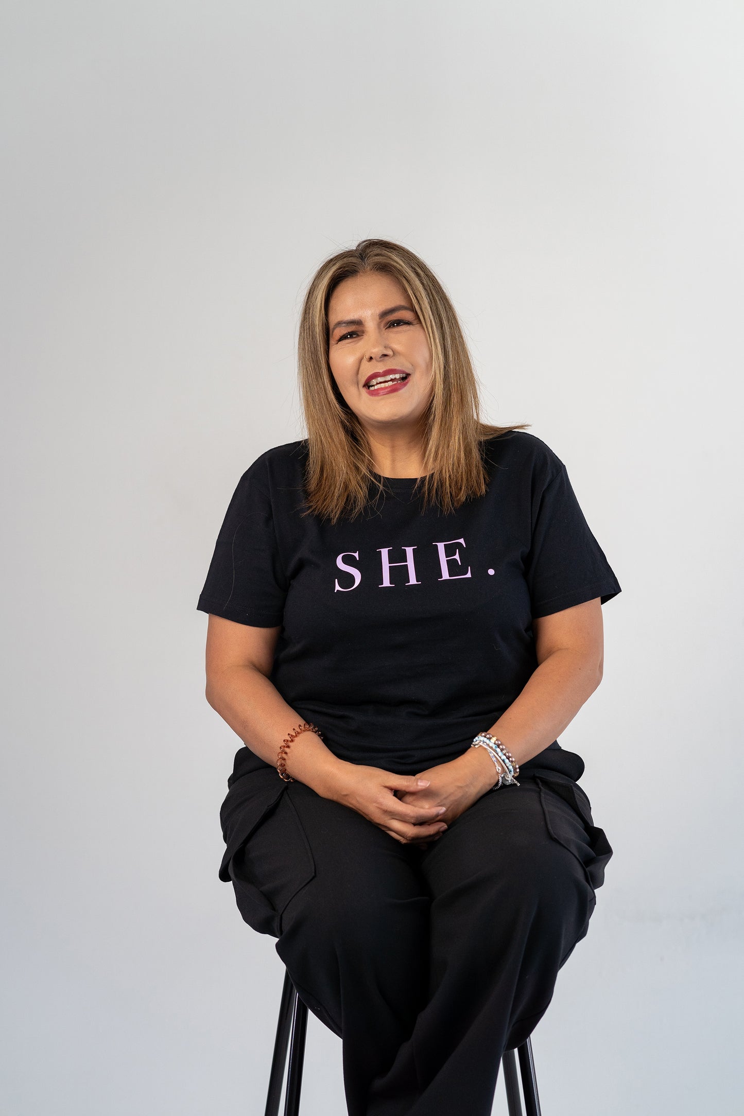 SHE. Morada