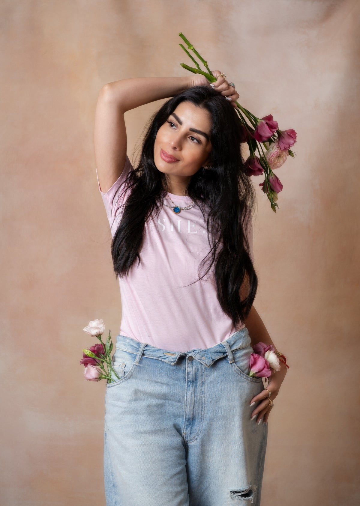 SHE. Rosa