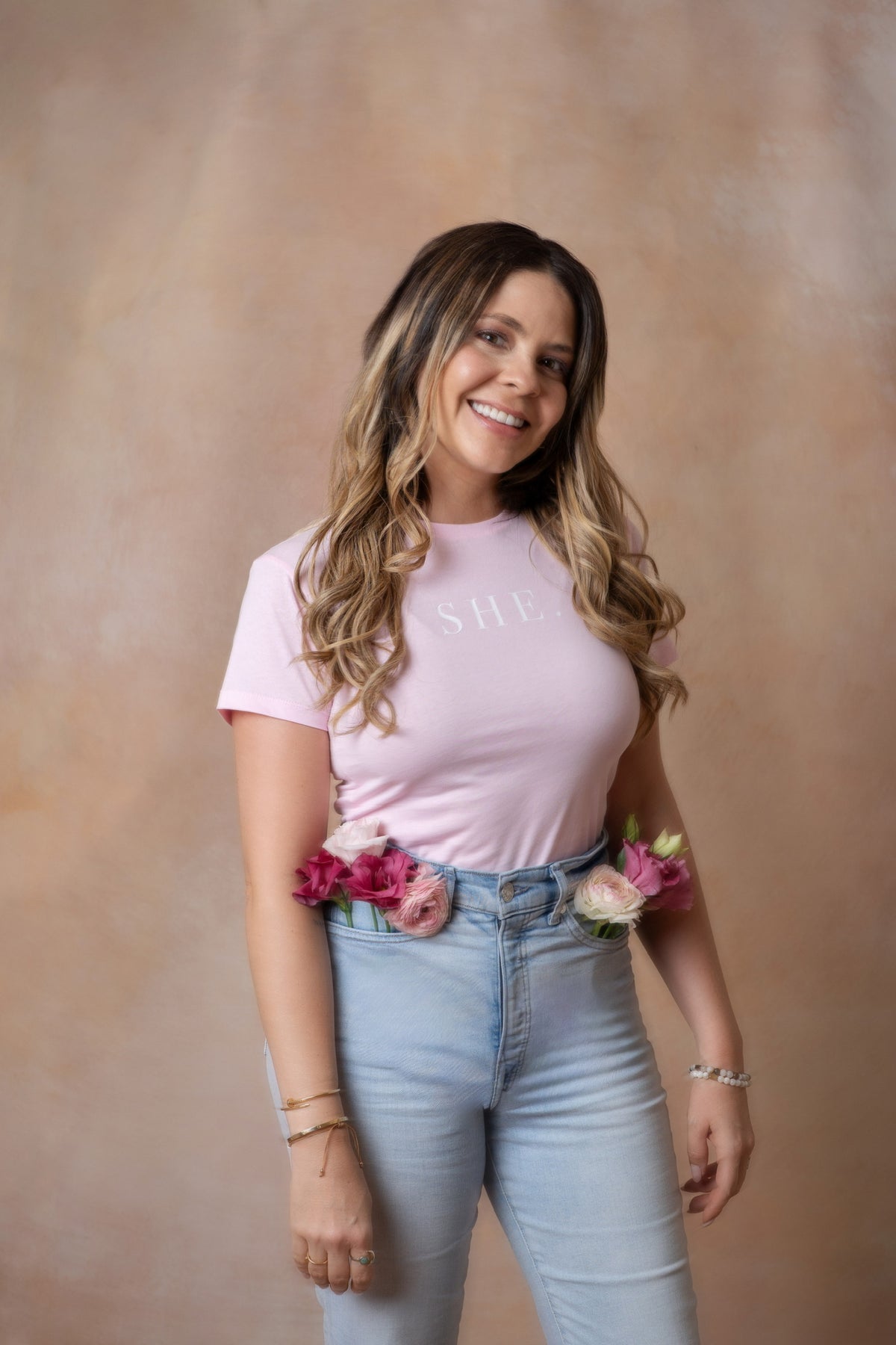 SHE. Rosa